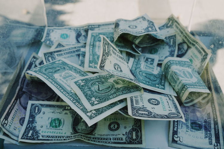 Close-up of paper currency in box
