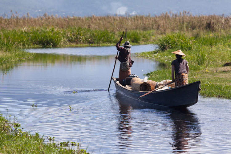 Local people in boat on inle lake