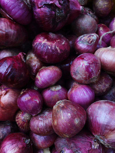 Full frame shot of onions at market stall