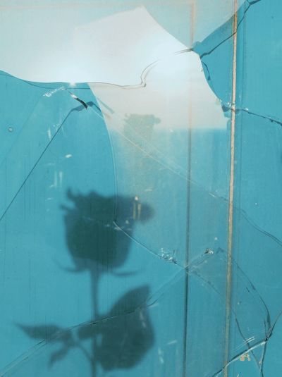 Full frame shot of broken glass window