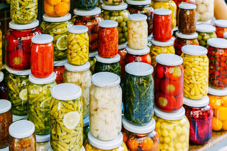 High angle view of pickled bottles for sale in market