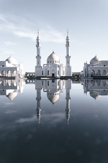 Reflection of mosque in water