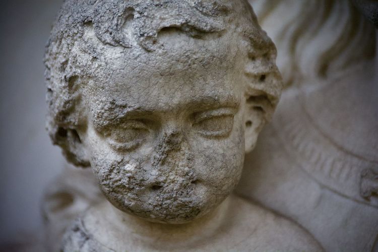 Close-up of angel statue.