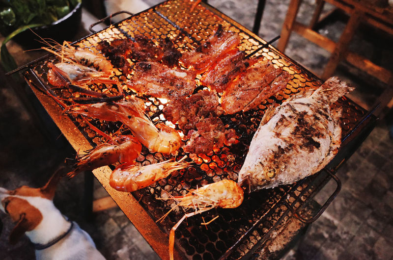 High angle view of food on barbecue grill