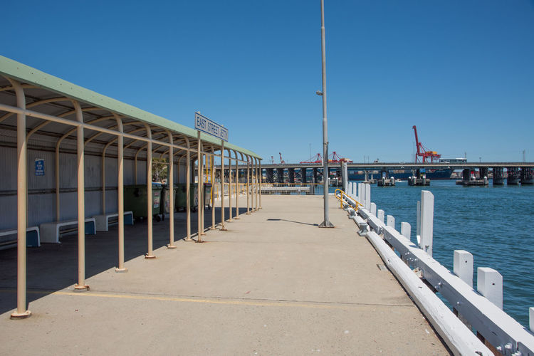 View of bridge against clear blue sky