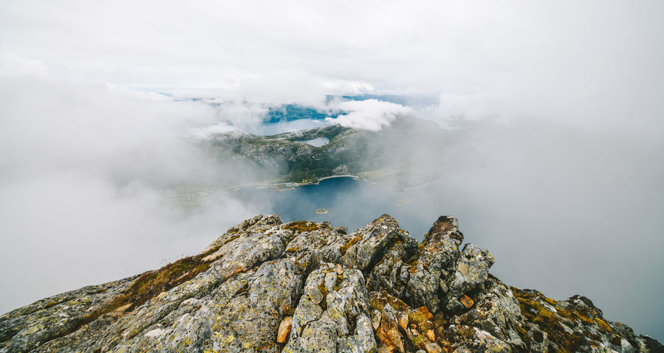 Aerial view of mountain by sea