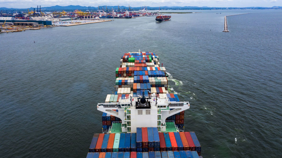 Aerial view container ship cargo freight shipping maritime vessel, global business supply chain.