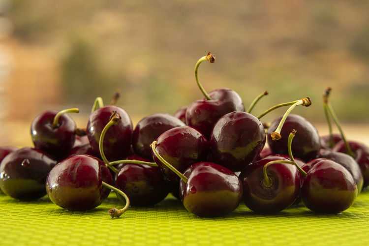 Close-up of grapes on table