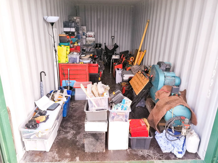 High angle view of various toys in container