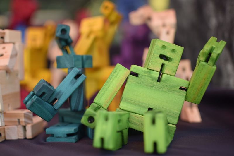 Close-up of colorful wooden toys on table
