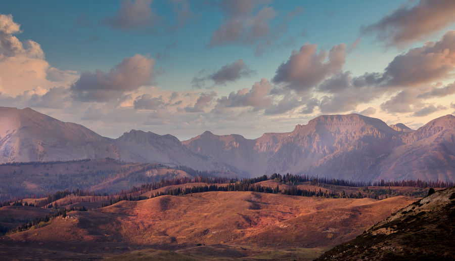 Majestic mountains glow in the late afternoon sun in beautiful wyoming usa