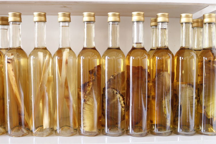 Close-up of oil in bottles