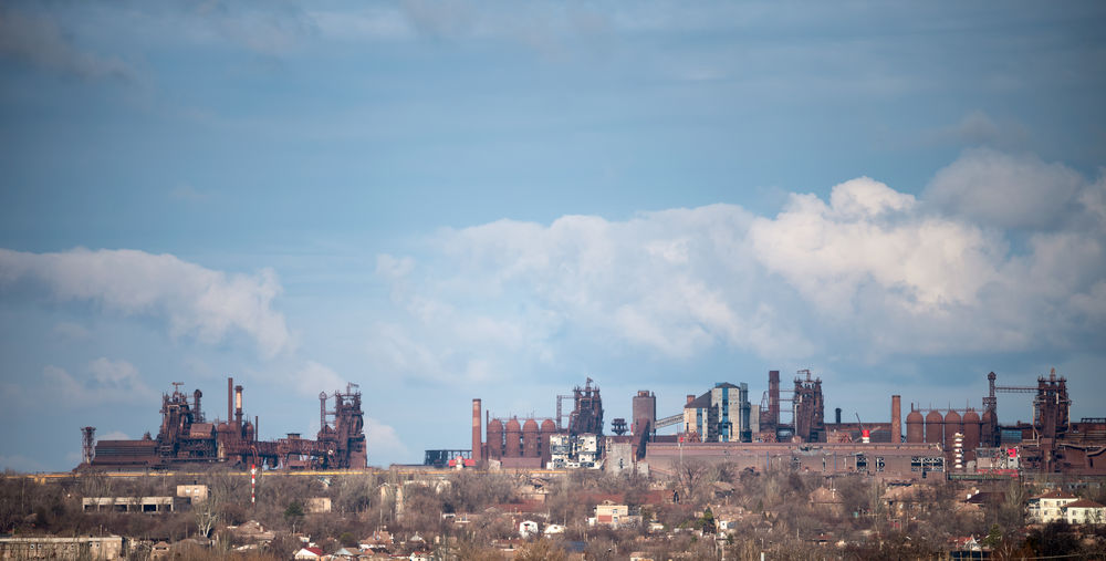 Buildings in city against sky