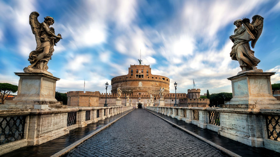Historic building against cloudy sky