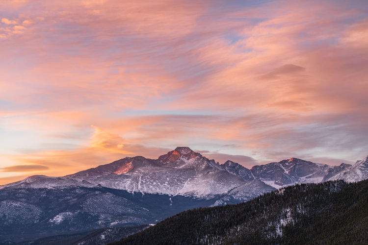 Scenic view of mountains against sky during sunset