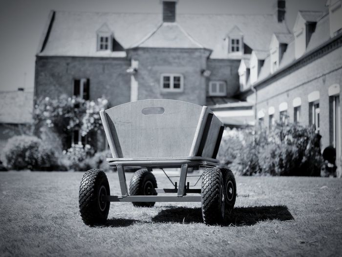Toy car outside house in city