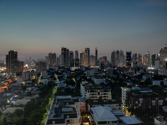 High angle view of buildings against sky in city