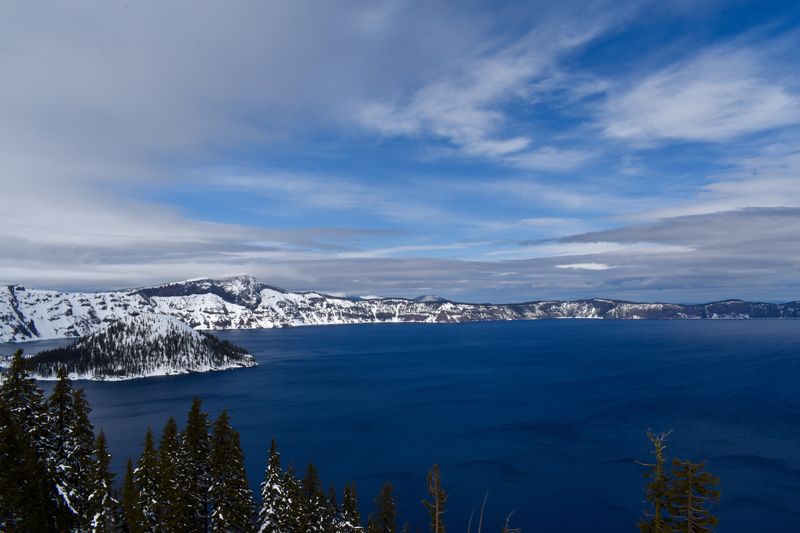 Scenic view of snowcapped mountains against sky during winter