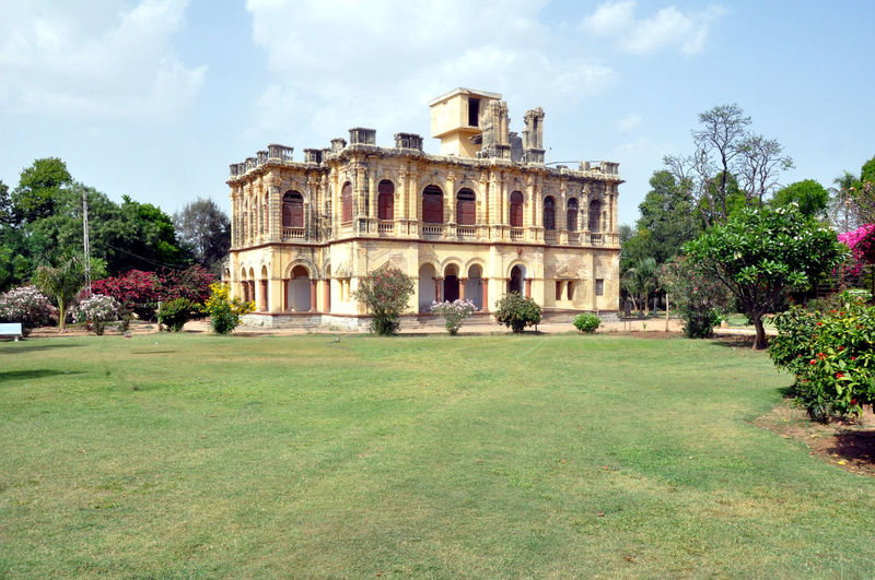 View of historical building in garden