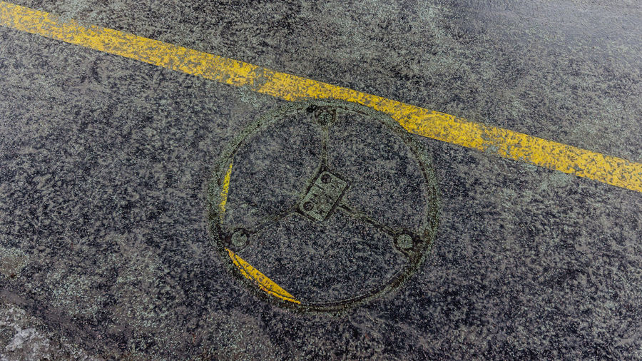 High angle view of manhole on road