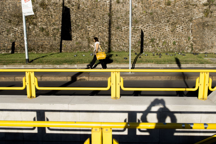 Woman with yellow umbrella