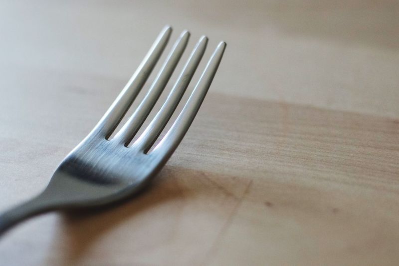 Close-up of spoon on table