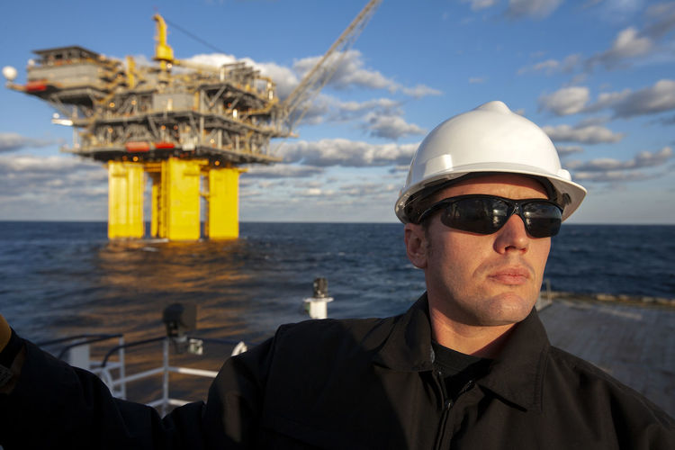 Offshore energy production with person on ship