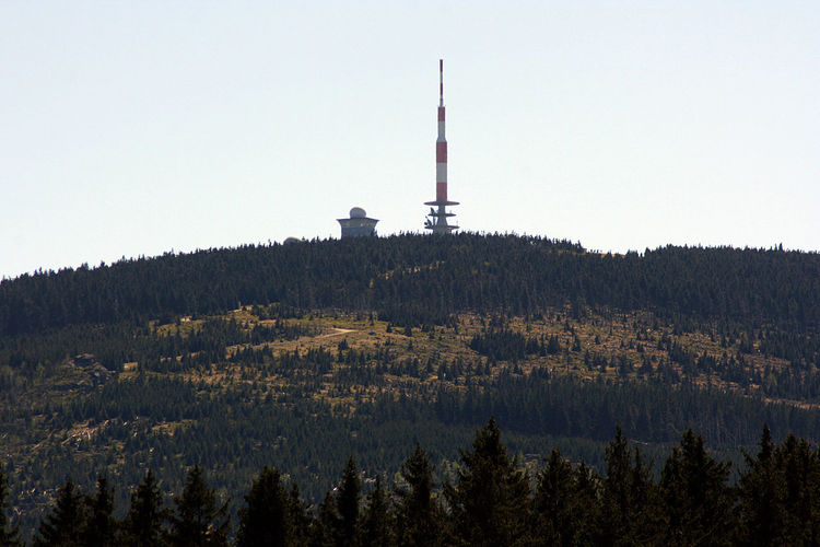 Low angle view of brocken against clear sky