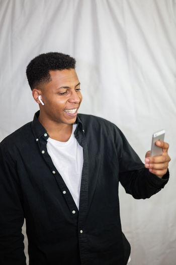 Young man using mobile phone