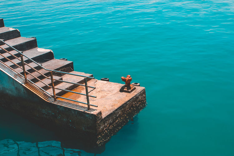 Water High Angle View Nature Blue Day Sea Outdoors No People Beauty In Nature Nautical Vessel Sunlight Waterfront Floating Turquoise Colored Tranquility Pier Floating On Water Staircase Staircases