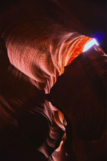 Low angle view of rock formations at night