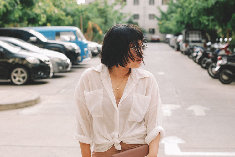 Young woman standing on street