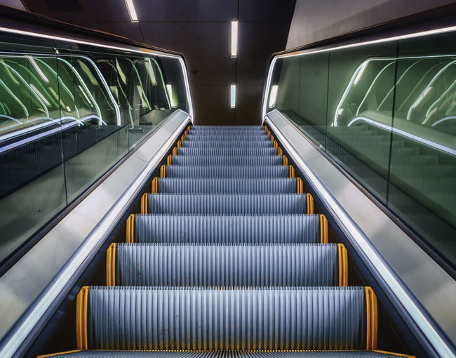 Low angle view of escalator at office