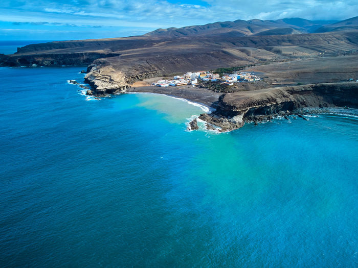 Aerial view of the atlantic ocean and the coastline in ajuy fuerteventura island drone photography