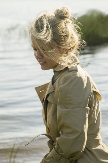 Rear view of woman looking at shore