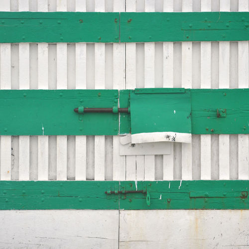 Close-up of wood against built structure