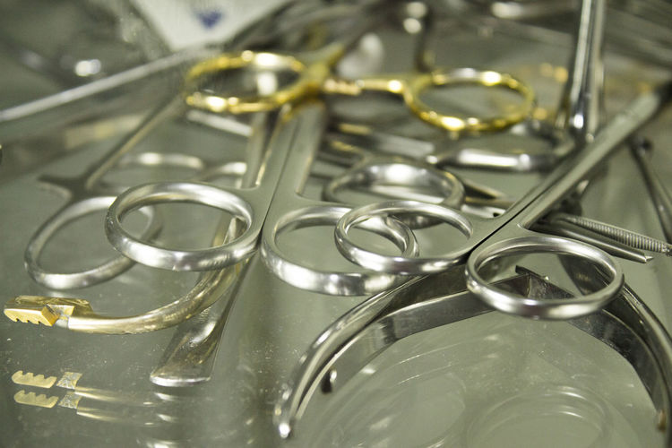 High angle view of surgical scissors in tray