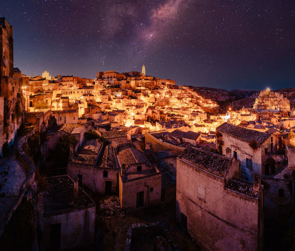 High angle view of townscape against sky at night