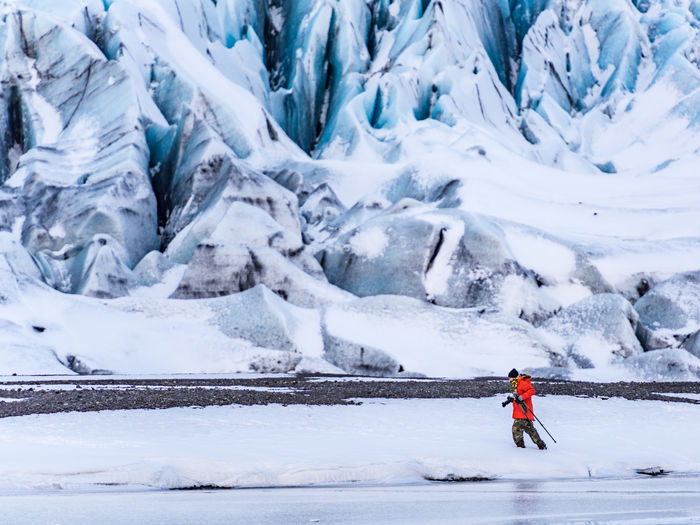 Man hiking in snowy landscape