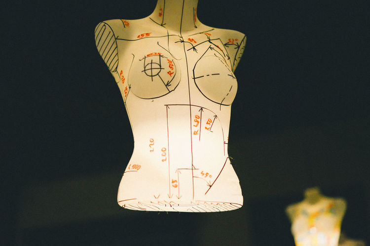 Illuminated dressmaker model with markings