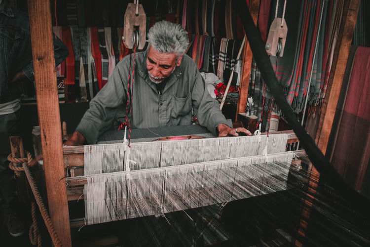 Man working in loom