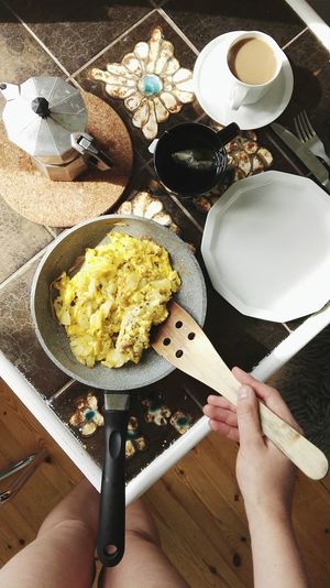 Cropped image of woman preparing breakfast at home