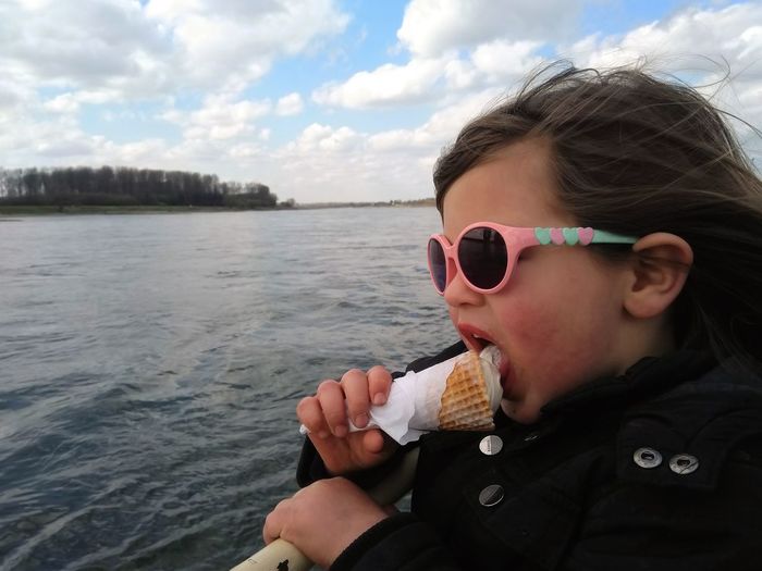 Portrait of young man drinking water