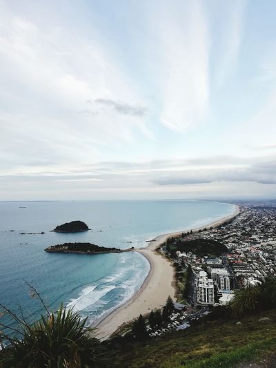 High angle view of bay against sky