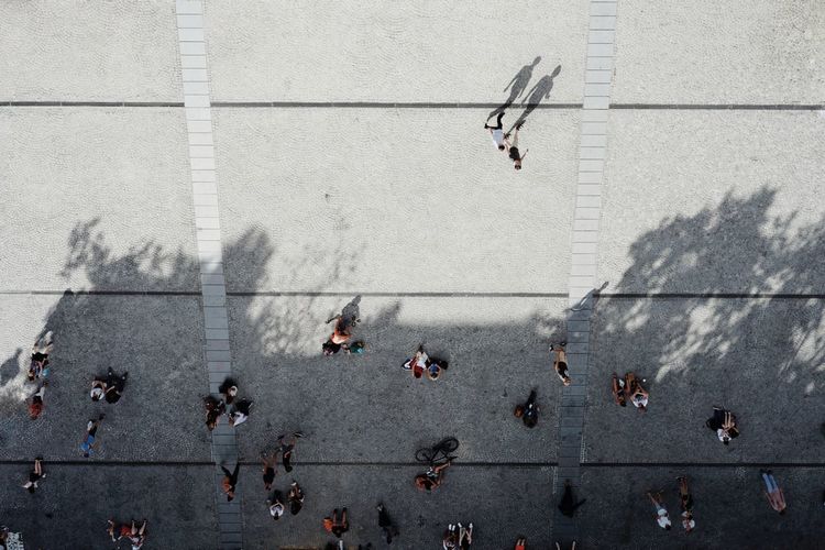 Directly above shot of people on footpath