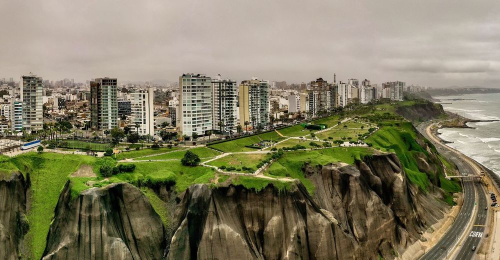 Panoramic view of buildings in lima against sky