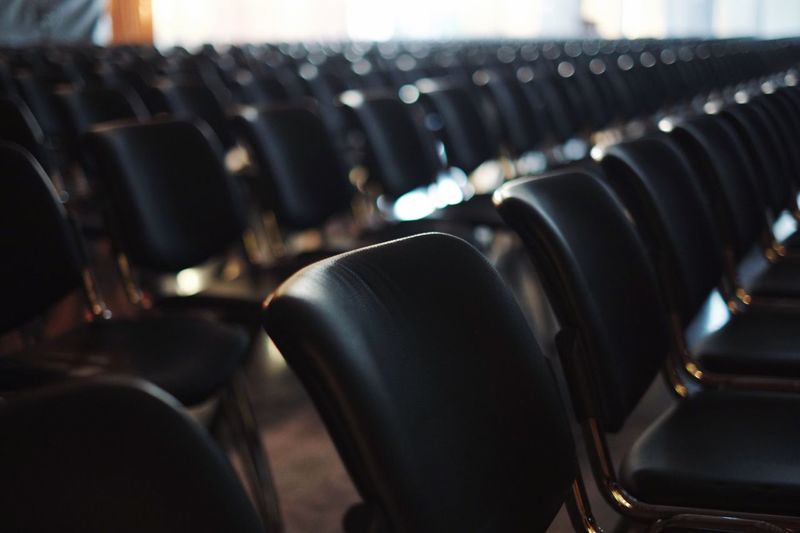 Empty chairs in auditorium