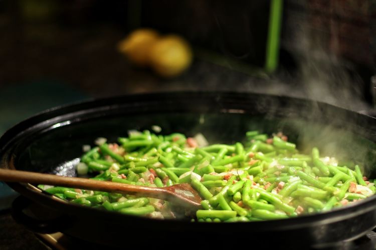 Close-up of chopped vegetables in cooking pan