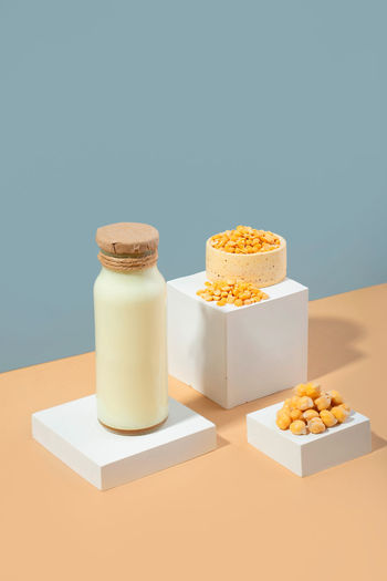 Vegetable pea milk.white podium.gluten and lactose free vegan product.isometric diagonal projection