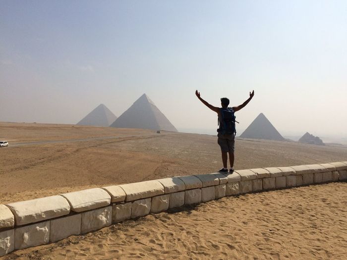 Rear view of man at pyramids